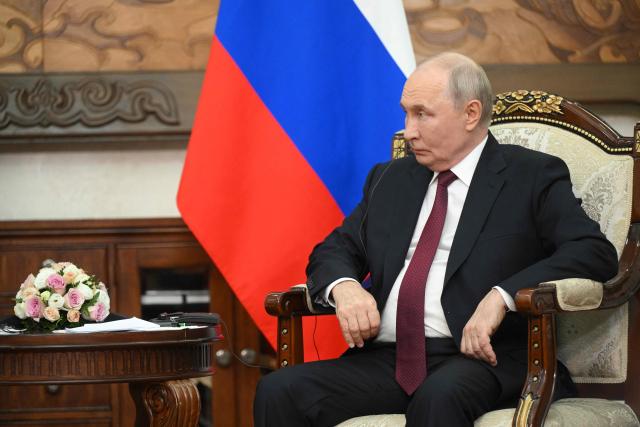 In this pool photograph distributed by the Russian state agency Sputnik, Russia's President Vladimir Putin attends a meeting with Iran's President on the sidelines of the Shanghai Cooperation Organisation (SCO) summit in Bishkek on September 1, 2026. (Photo by Kristina Solovyova / POOL / AFP)