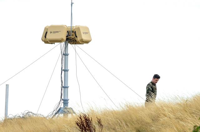 A member of Ireland's Army walks past a Cerbair HYDRA 300 drone detection system, during an informal meeting of EU defence ministers (FAC Defence) at Druids Glen in Wicklow, south of Dublin, Ireland, on September 1, 2026. EU defence and foreign ministers gathering in Ireland from September 1 will grapple with bolstering Ukraine's air defences amid growing worries over Russia's campaign to destabilise Kyiv's European backers. (Photo by Paul Faith / AFP)
