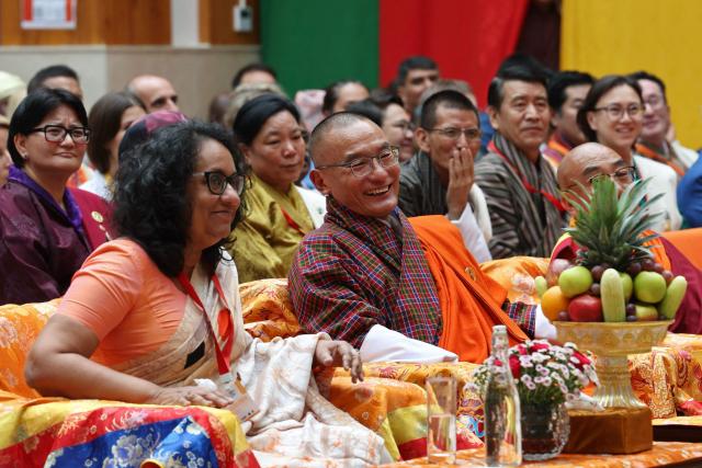 Bhutan's Prime Minister Tshering Tobgay (C) reacts next to his Sri Lankan counterpart Harini Amarasuriya during the Global Conscious Food Systems Summit in Paro, Bhutan on September 1, 2026. (Photo by Niharika KULKARNI / AFP)