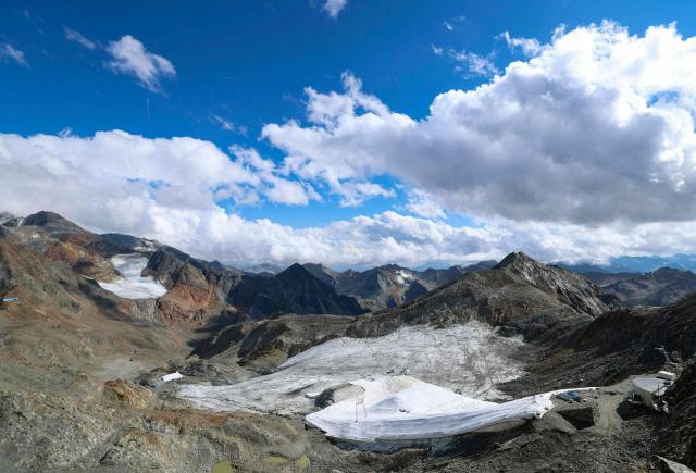 This photo taken on September 1, 2026 shows a view over the Stubai Glacier near Neustift im Stubaital, Austria. By 2026, experts are increasingly speaking of structural disintegration regarding the state of Austria’s glaciers. The latest glacier report (2024/25) reveals that the country's ice masses are no longer just shrinking; they are collapsing in their very substance. (Photo by Johann GRODER / various sources / AFP) / Austria OUT
