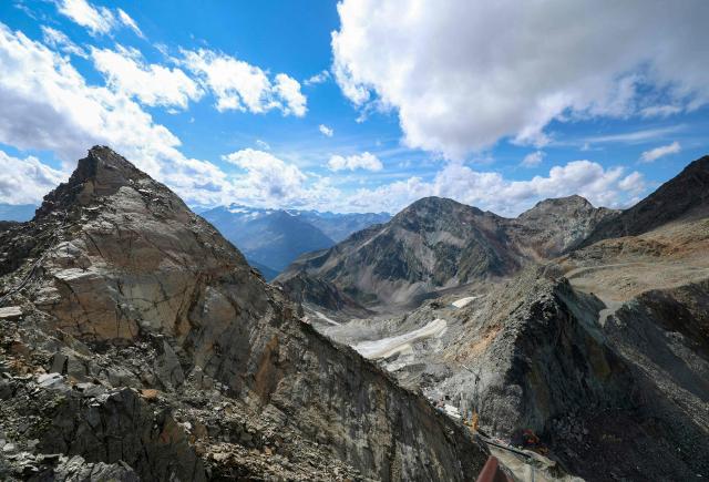 This photo taken on September 1, 2026 shows a view over the Stubai Glacier near Neustift im Stubaital, Austria. By 2026, experts are increasingly speaking of structural disintegration regarding the state of Austria’s glaciers. The latest glacier report (2024/25) reveals that the country's ice masses are no longer just shrinking; they are collapsing in their very substance. (Photo by Johann GRODER / various sources / AFP) / Austria OUT