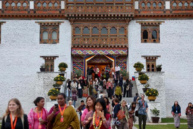 Participants exit the Dungkar Dzong after attending the Global Conscious Food Systems Summit in Paro, Bhutan on September 1, 2026. (Photo by Niharika KULKARNI / AFP)