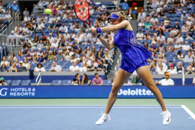 Russia's Alina Korneeva hits a return to USA's Madison Keys during their women's singles first round tennis match on day three of the US Open tennis tournament at the USTA Billie Jean King National Tennis Center in New York on September 1, 2026. (Photo by KENA BETANCUR / AFP)