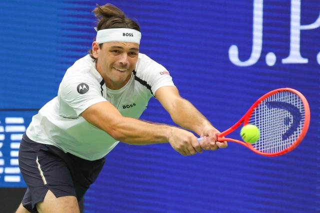 USA's Taylor Fritz hits a return to USA's Darwin Blanch during their men's singles first round tennis match on day three of the US Open tennis tournament at the USTA Billie Jean King National Tennis Center in New York City on September 1, 2026. (Photo by KENA BETANCUR / AFP)