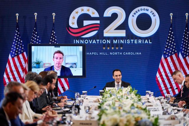 Meta CEO Mark Zuckerberg is displayed on a screen as White House Office of Science and Technology Policy Director Michael Kratsios speaks during the G20 Innovation Ministerial meeting in Chapel Hill, North Carolina, on September 1, 2026. (Photo by Matt RAMEY / AFP)