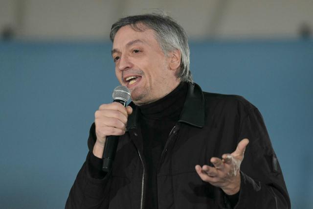 Deputy Maximo Kirchner, son of former Argentine President and Vice President Cristina Fernandez de Kirchner, delivers a speech below her house arrest on September 1, 2026, during the fourth anniversary of the failed assassination attempt against her. (Photo by JUAN MABROMATA / AFP)