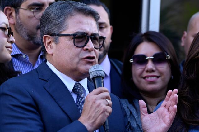 Former Honduran president Juan Orlando Hernandez (2014-2022) speaks to the press outside the Supreme Court of Justice in Tegucigalpa on September 1, 2026, after a judge dismissed corruption charges against him. Honduran justice on September 1 dismissed corruption charges against former president Juan Orlando Hernandez, who had previously been pardoned by US President Donald Trump following a drug trafficking conviction in the United States, the judiciary said. (Photo by Orlando SIERRA / AFP)
