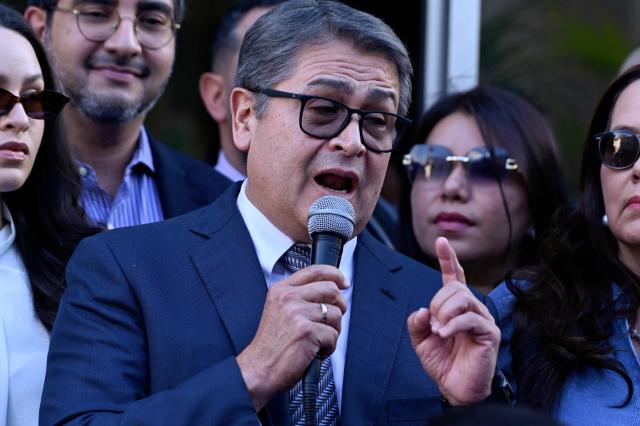 Former Honduran president Juan Orlando Hernandez (2014-2022) speaks to the press outside the Supreme Court of Justice in Tegucigalpa on September 1, 2026, after a judge dismissed corruption charges against him. Honduran justice on September 1 dismissed corruption charges against former president Juan Orlando Hernandez, who had previously been pardoned by US President Donald Trump following a drug trafficking conviction in the United States, the judiciary said. (Photo by Orlando SIERRA / AFP)