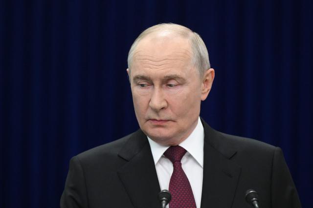 In this pool photograph distributed by the Russian state agency Sputnik, Russia's President Vladimir Putin meets with the media after the Shanghai Cooperation Organisation (SCO) summit in Bishkek on September 1, 2026. (Photo by Kristina Solovyova / POOL / AFP)