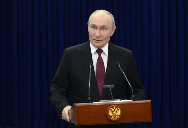 In this pool photograph distributed by the Russian state agency Sputnik, Russia's President Vladimir Putin meets with the media after the Shanghai Cooperation Organisation (SCO) summit in Bishkek on September 1, 2026. (Photo by Kristina Solovyova / POOL / AFP)