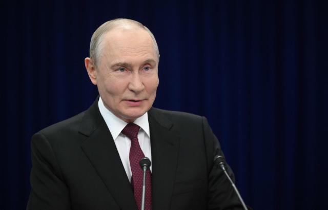 In this pool photograph distributed by the Russian state agency Sputnik, Russia's President Vladimir Putin meets with the media after the Shanghai Cooperation Organisation (SCO) summit in Bishkek on September 1, 2026. (Photo by Kristina Solovyova / POOL / AFP)