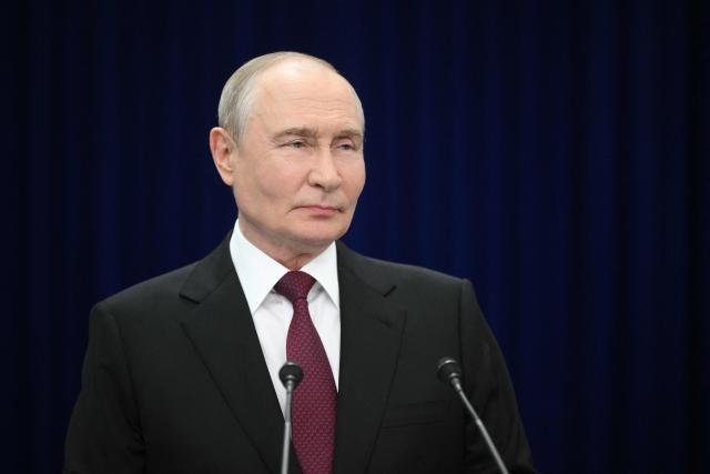In this pool photograph distributed by the Russian state agency Sputnik, Russia's President Vladimir Putin meets with the media after the Shanghai Cooperation Organisation (SCO) summit in Bishkek on September 1, 2026. (Photo by Kristina Solovyova / POOL / AFP)