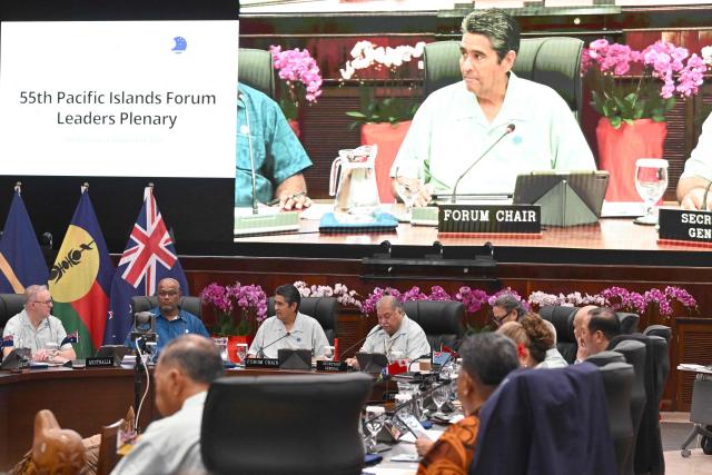 President of Palau Surangel Samuel Whipps Jr. (C) presides over the  Pacific Islands Forum Leaders’ plenary meeting in Koror on September 2, 2026. (Photo by SAEED KHAN / AFP)