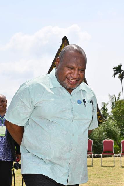Papua New Guinea Prime Minister James Marape leaves after a family photo event during the Pacific Islands Forum Leaders’ plenary meeting in Koror on September 2, 2026. (Photo by SAEED KHAN / AFP)