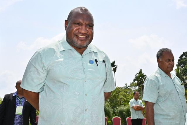 Papua New Guinea Prime Minister James Marape leaves after a family photo event during the Pacific Islands Forum Leaders’ plenary meeting in Koror on September 2, 2026. (Photo by SAEED KHAN / AFP)