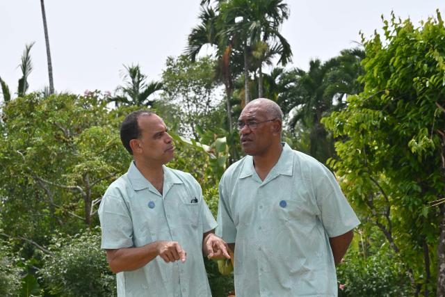 Vanuatu Minister for Climate Change Ralph Regenvanu (L) speaks with President of the Government of New Caledonia Alcide Ponga as they leave following a family photo during the Pacific Islands Forum Leaders' plenary meeting in Koror on September 2, 2026. (Photo by SAEED KHAN / AFP)