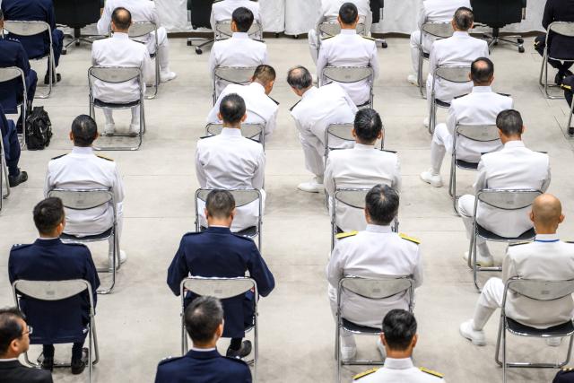 Officials attend the self defence forces senior commanders’ conference at the Ministry of Defence in Tokyo September 2, 2026. (Photo by Philip FONG / AFP)