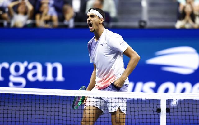 Italy's Lorenzo Sonego reacts to a point during the men's singles first round tennis match against Germany's Alexander Zverev on day three of the US Open tennis tournament at the USTA Billie Jean King National Tennis Center in New York City on September 1, 2026. (Photo by CHARLY TRIBALLEAU / AFP)
