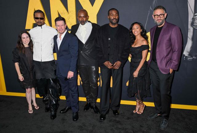 (L/R) US producer Erica Lee, US producer and costume designer Chester Algernal Gordon, US actor and producer Mark Wahlberg, US filmmaker Elegance Bratton, US actor Yahya Abdul-Mateen II, US actress Nicole Beharie and Canadian producer Alex Lebovici attend the premiere of Paramount Pictures' "By Any Means" at the Paramount Theatre in Los Angeles on September 1, 2026. (Photo by Katie FLORES / AFP)