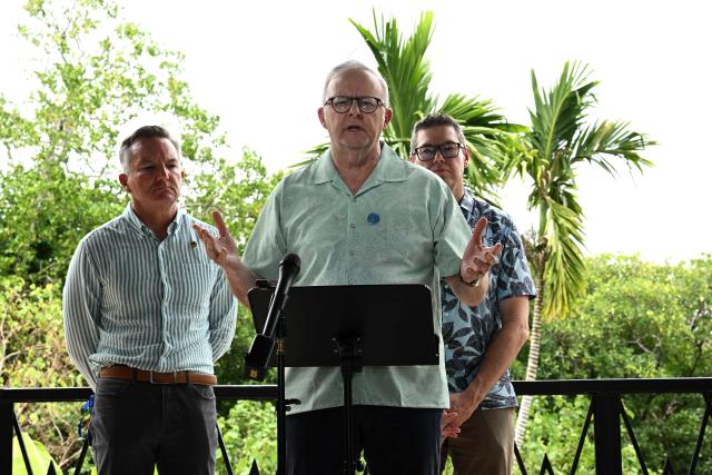 Australia's Prime Minister Anthony Albanese (C) stands with Australia's Minister for Climate Change and Energy Chris Bowen (L) and the Minister for Defence Industry Pat Conroy during a press conference at the 55th Pacific Islands Forum Leaders Meeting in the capital city of Koror in Palau on September 2, 2026. (Photo by SAEED KHAN / AFP)