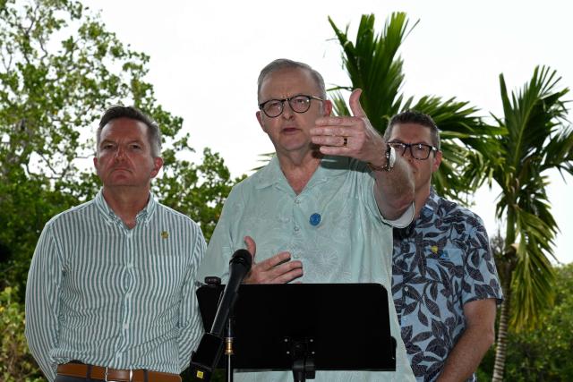 Australia's Prime Minister Anthony Albanese (C) stands with Australia's Minister for Climate Change and Energy Chris Bowen (L) and the Minister for Defence Industry Pat Conroy during a press conference at the 55th Pacific Islands Forum Leaders Meeting in the capital city of Koror in Palau on September 2, 2026. (Photo by SAEED KHAN / AFP)