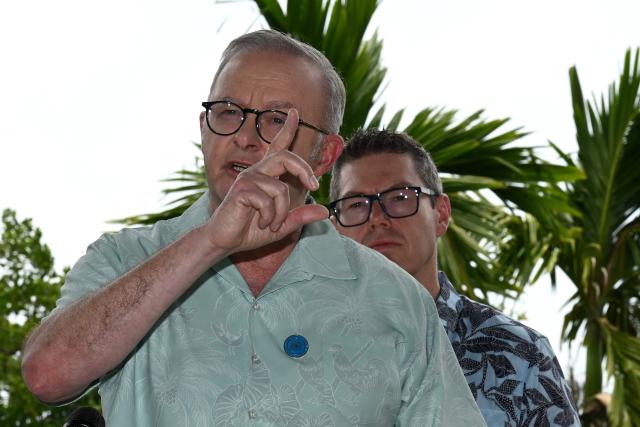 Australia's Prime Minister Anthony Albanese stands with Minister for Defence Industry Pat Conroy (R) during a press conference at the 55th Pacific Islands Forum Leaders Meeting in the capital city of Koror in Palau on September 2, 2026. (Photo by SAEED KHAN / AFP)