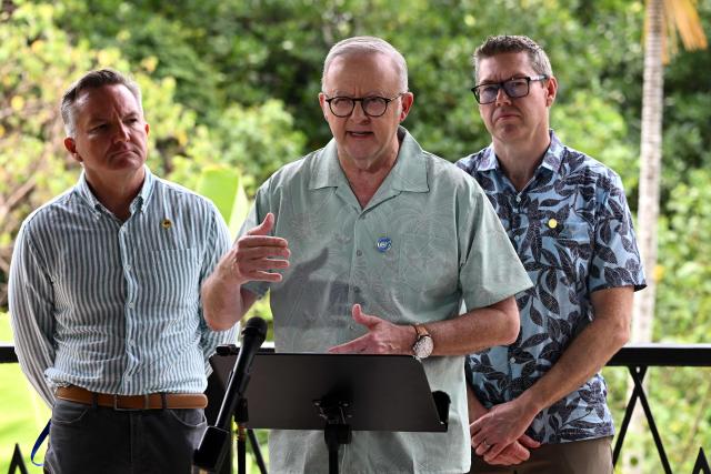 Australia's Prime Minister Anthony Albanese (C) with  Australia's Minister for Climate Change and Energy Chris Bowen (L) and the Minister for Defence Industry Pat Conroy speaks at a press conference at the 55th Pacific Islands Forum Leaders Meeting in the capital city of Koror in Palau on September 2, 2026. (Photo by SAEED KHAN / AFP)