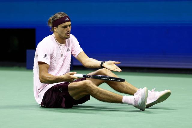 Germany's Alexander Zverev complains about his shoes after falling during the men's singles first-round tennis match against Italy's Lorenzo Sonego on day three of the US Open tennis tournament at the USTA Billie Jean King National Tennis Center in New York City on September 1, 2026. (Photo by CHARLY TRIBALLEAU / AFP)