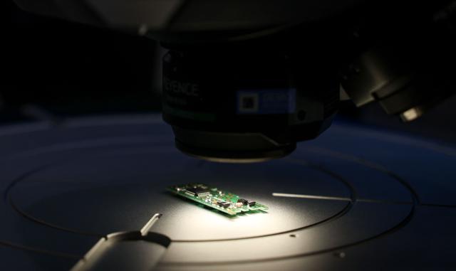 An inspection system examines an electronic component during SEMICON Taiwan in Taipei on September 2, 2026. (Photo by I-Hwa Cheng / AFP)