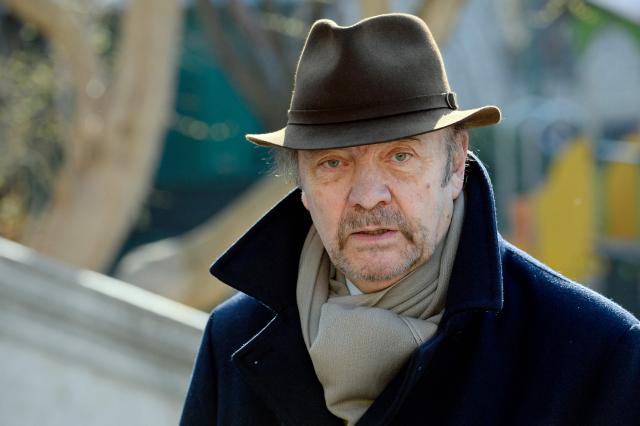 (FILES) French director Jean-Paul Rappeneau attends the funeral of French director Alain Resnais at the Saint-Vincent de Paul church in Paris on March 10, 2014. French filmmaker Jean-Paul Rappeneau, the multi-César-winning director of eight feature films, including "Cyrano de Bergerac" (1990), died in Paris on September 1, 2026 at the age of 94, one of his sons announced to AFP on September 2, 2026. (Photo by Lionel BONAVENTURE / AFP)