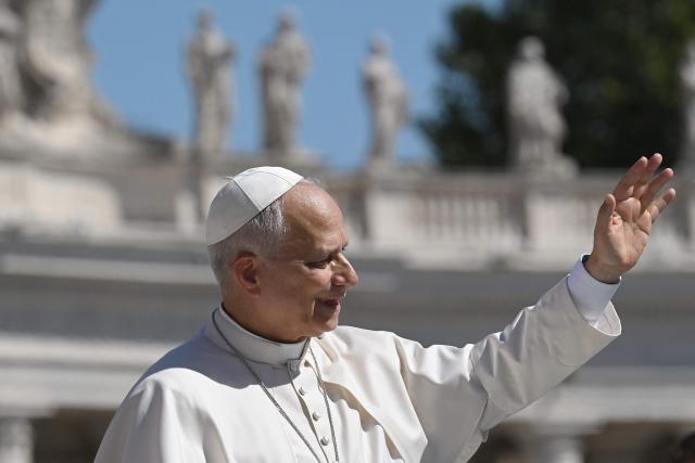 Pope Leo XIV waves to the crowd as leaves following the weekly general audience at St Peter's Square in the Vatican on September 2, 2026. (Photo by Andreas SOLARO / AFP)