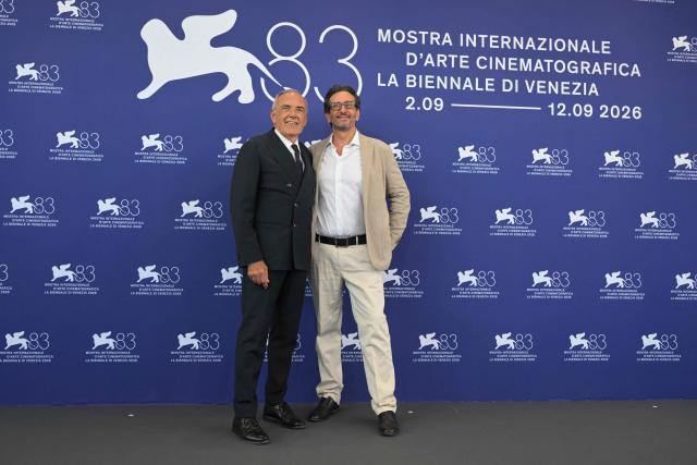 Italian director of the Venice International Film Festival Alberto Barbera and Italian film director and screenwriter Daniele Vicari, President of Venice Classics attend a photocall during the 83rd International Venice Film Festival, at Venice Lido on September 2, 2026. (Photo by Tiziana FABI / AFP)