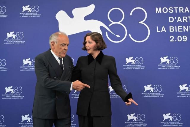 Italian director of the Venice International Film Festival Alberto Barbera poses with the President of the Jury, US actress Maggie Gyllenhaal during a photocall at the 83rd International Venice Film Festival, at Venice Lido on September 2, 2026. (Photo by Tiziana FABI / AFP)