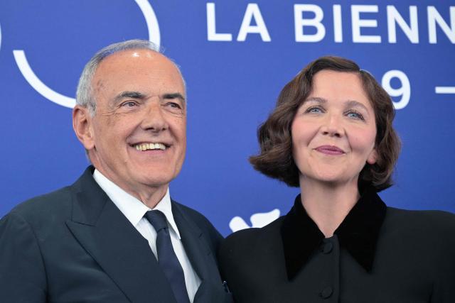 Italian director of the Venice International Film Festival Alberto Barbera poses with the President of the Jury, US actress Maggie Gyllenhaal during a photocall at the 83rd International Venice Film Festival, at Venice Lido on September 2, 2026. (Photo by Tiziana FABI / AFP)