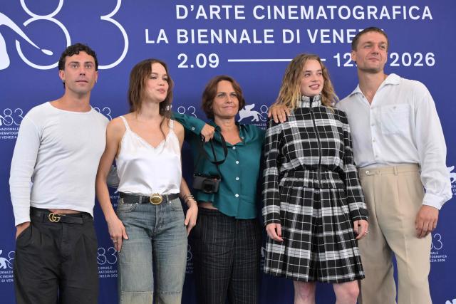 (From L) Actor Aaron Altaras, German actress Emilia Schule, director Alina Marazzi, Swiss actress Luna Wedler and Austrian actor Lucas Englander attend the photocall of the movie "The Girl with the Leica" (La ragazza con la Leica) presented in the Orizzonti selection at the 83rd International Venice Film Festival, at Venice Lido on September 2, 2026. (Photo by Tiziana FABI / AFP)