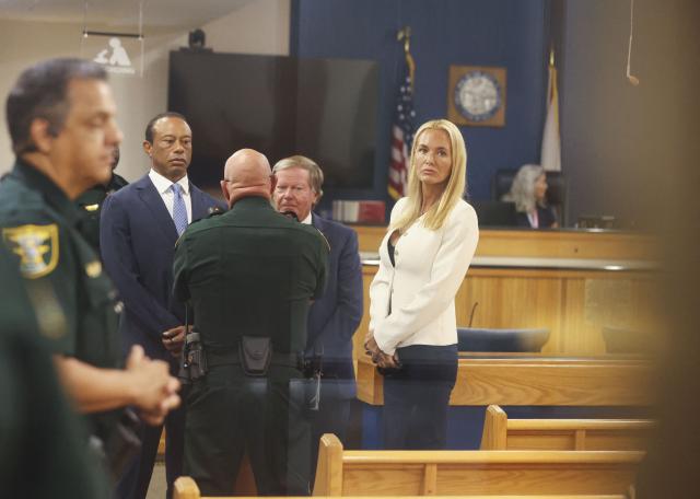 US golfer Tiger Woods (2L) appears in County Judge Darren Steele’s courtroom for a plea hearing from an arrest in March at the Martin County Courthouse in Stuart, Florida in September 2, 2026. Tiger Woods pleaded guilty on Wednesday to charges of careless and reckless driving stemming from a rollover car crash in Florida in March. (Photo by Crystal Vander Weit / POOL / AFP)