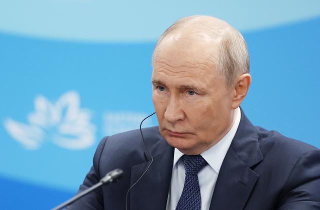 In this pool photograph distributed by the Russian state agency Sputnik, Russia's President Vladimir Putin attends a meeting with Chinese Vice Premier on the sidelines of the Eastern Economic Forum in Vladivostok on September 2, 2026. (Photo by Vyacheslav PROKOFYEV / POOL / AFP)