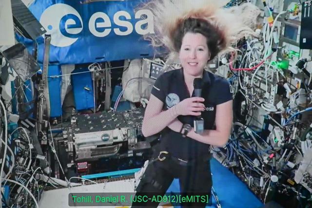 This video screen displays French ESA astronaut Sophie Adenot, who is aboard the International Space Station (ISS), speaking to the journalists at the European Space Agency (ESA) headquarters in Paris on September 2, 2026. (Photo by LOU BENOIST / AFP)