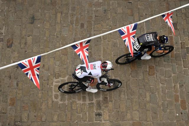 UAE Team Emirates XRG's Danish rider Mikkel Norsgaard Bjerg (L) and Team Storck-MRW BAU's Luxemberg rider Noe Ury take part in the first stage of the Tour of Britain cycle race in Lincoln, eastern England on September 2, 2026. (Photo by Oli SCARFF / AFP)
