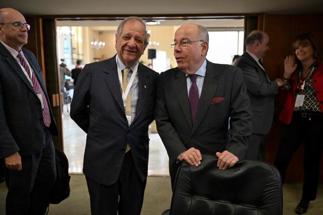 Outgoing ALADI president Uruguayan Sergio Abreu (L) and Brazil's Foreign Minister Mauro Vieira (R) talk during the 20th Meeting of the Council of Foreign Ministers at the Latin American Integration Association (ALADI) headquarters in Montevideo on September 2, 2026. (Photo by Eitan ABRAMOVICH / AFP)