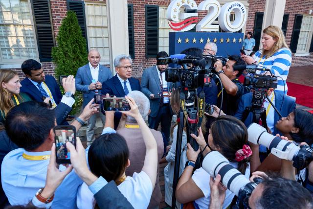 NVIDIA CEO Jensen Huang speaks to the press during the G20 Innovation Ministerial outside the Carolina Inn in Chapel Hill, North Carolina, on September 2, 2026. (Photo by Matt RAMEY / AFP)