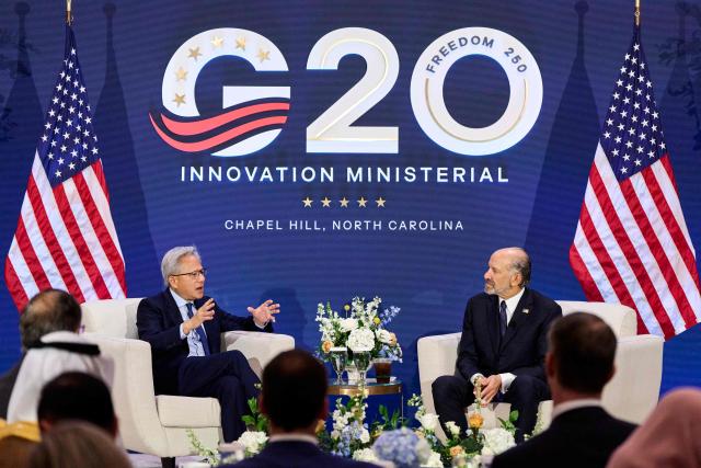 NVIDIA CEO Jensen Huang and US Secretary of Commerce Howard Lutnick speak during the G20 Innovation Ministerial in Chapel Hill, North Carolina, on September 2, 2026. (Photo by Matt RAMEY / AFP)