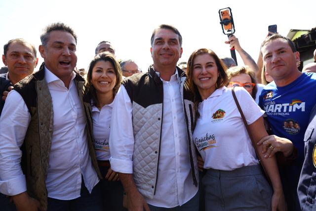 Brazilian presidential candidate Flavio Bolsonaro (C), of the Liberal Party (PL), attends the Expointer agricultural fair in Esteio, Rio Grande do Sul state, Brazil on September 2, 2026. Brazil will hold a presidential election on October 4, 2026. (Photo by SILVIO AVILA / AFP)