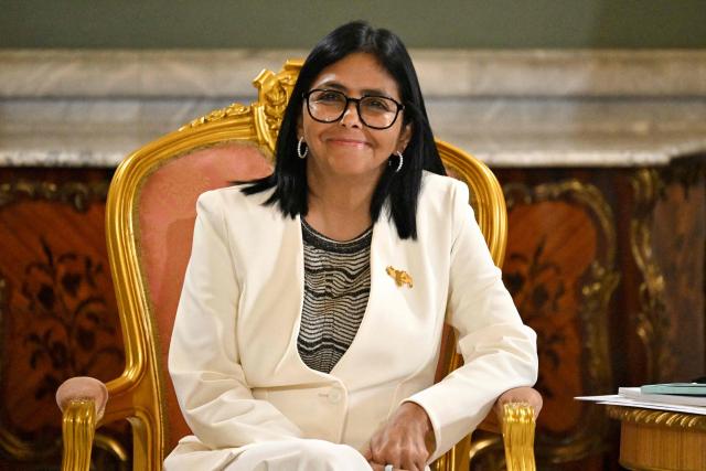 Venezuela's interim President Delcy Rodriguez smiles during a meeting US Energy Secretary Chris Wright (out of frame) over an oil agreement at the Miraflores Presidential Palace in Caracas on September 2, 2026. US Energy Secretary Chris Wright visits Venezuela to finalize an agreement after US President Donald Trump announced that the United States will take a majority stake in 65 billion barrels of Venezuela's oil reserves, in what he described as "the largest oil deal in history." (Photo by Juan BARRETO / AFP)