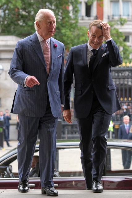 Britain's King Charles III (L) and France's President Emmanuel Macron (R) arrive to attend a preview event for the Bayeux Tapestry Exhibition at the British Museum in London on September 2, 2026. (Photo by Thomas Krych / POOL / AFP)