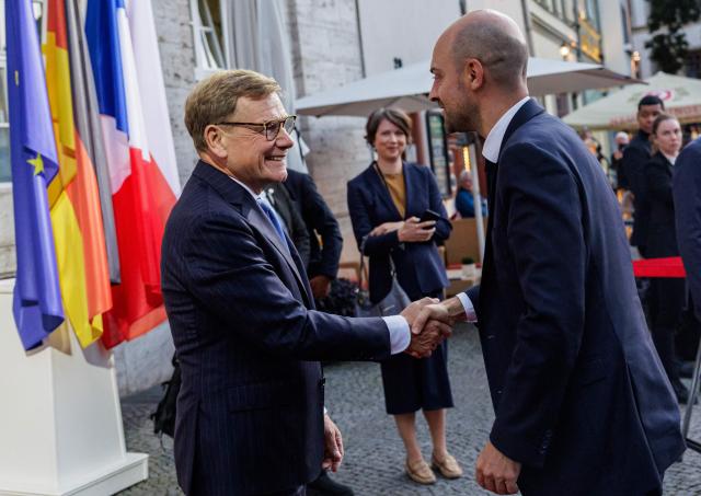 German Foreign Minister Johann Wadephul (L) and French Foreign Minister Jean-Noel Barrot shake hands as they meet in Weimar on September 2, 2026, for talks within the Weimar Triangle format. The Weimar Triangle foreign ministers' meeting marks the forum's 35th anniversary this year. (Photo by Jens SCHLUETER / AFP)