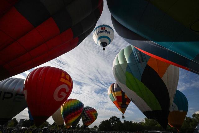 Hot-air balloons are seen during the hot air balloon Fiesta on September 2, 2026 in Hradec Kralove city, Czech Republic. (Photo by Michal Cizek / AFP)