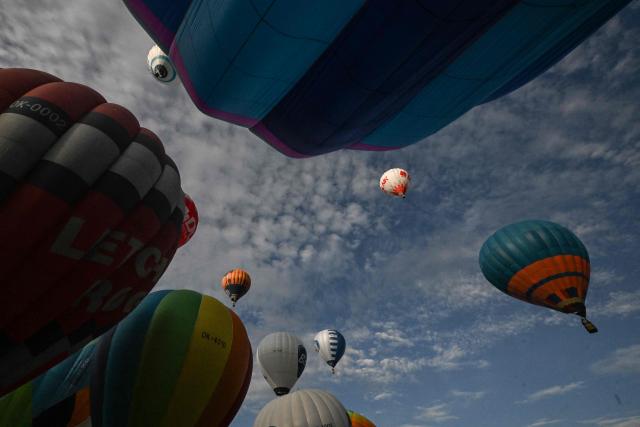 Hot-air balloons are seen during the hot air balloon Fiesta on September 2, 2026 in Hradec Kralove city, Czech Republic. (Photo by Michal Cizek / AFP)