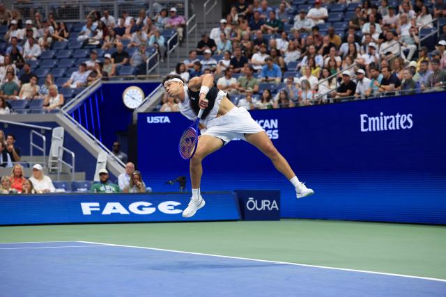 USA's Ben Shelton serves to Poland's Hubert Hurkacz during their men's singles second round tennis match against on day four of the US Open tennis tournament at the USTA Billie Jean King National Tennis Center in New York on September 2, 2026. (Photo by TIMOTHY A. CLARY / AFP)