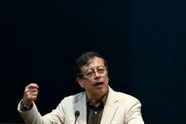 Former Colombian president Gustavo Petro gestures as he speaks during his conference, "Capital in the 21st Century: The Political Economy of the Climate Crisis," at the National Autonomous University of Mexico (UNAM) in Mexico City on September 2, 2026. (Photo by YURI CORTEZ / AFP)